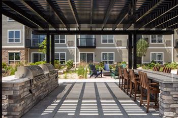 Multi-use courtyard with grilling station